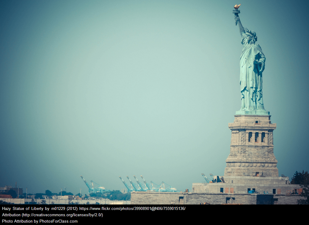 a symbol for open borders in the statue of liberty