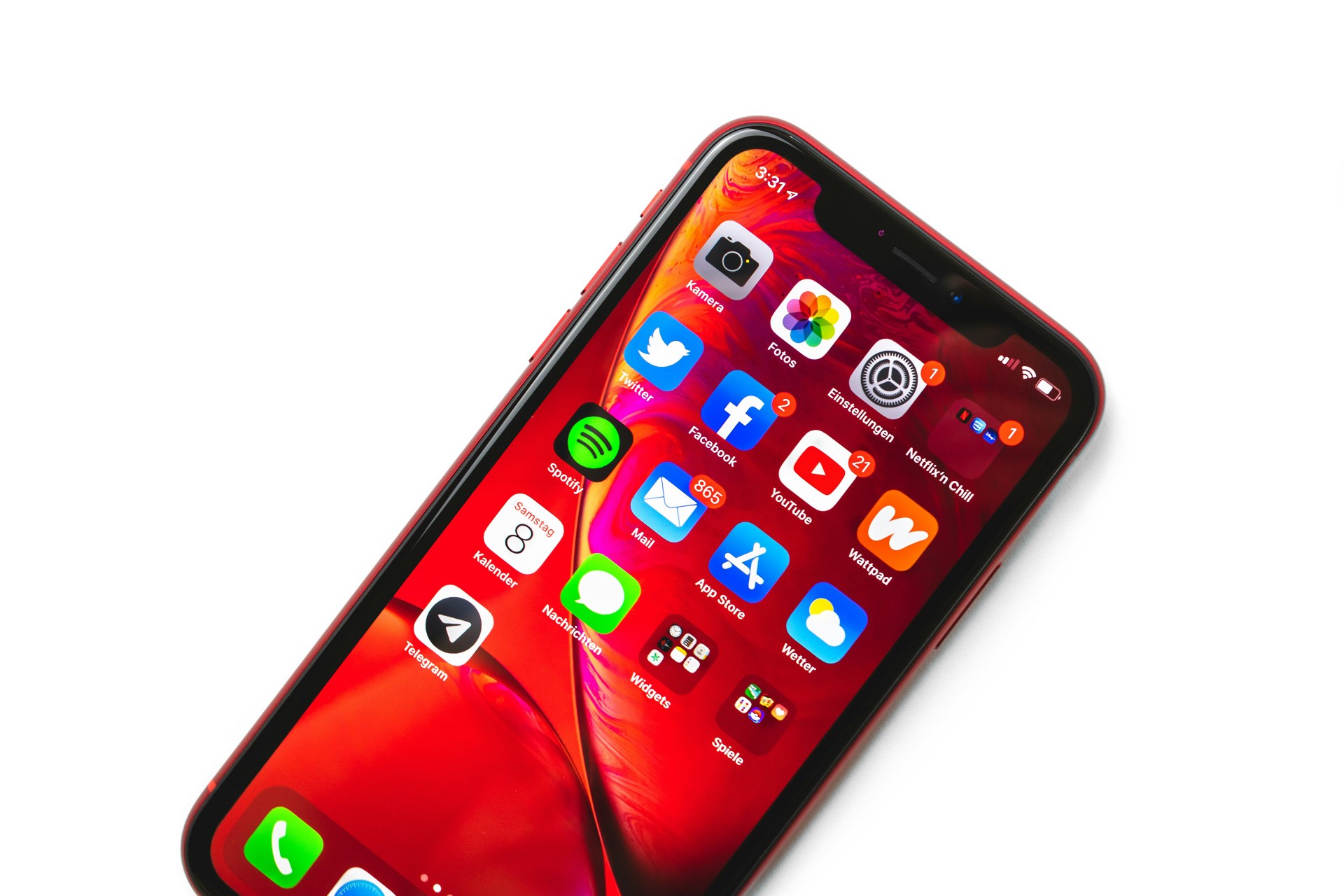 An iPhone on a white background with a collection of app icons displayed on the screen