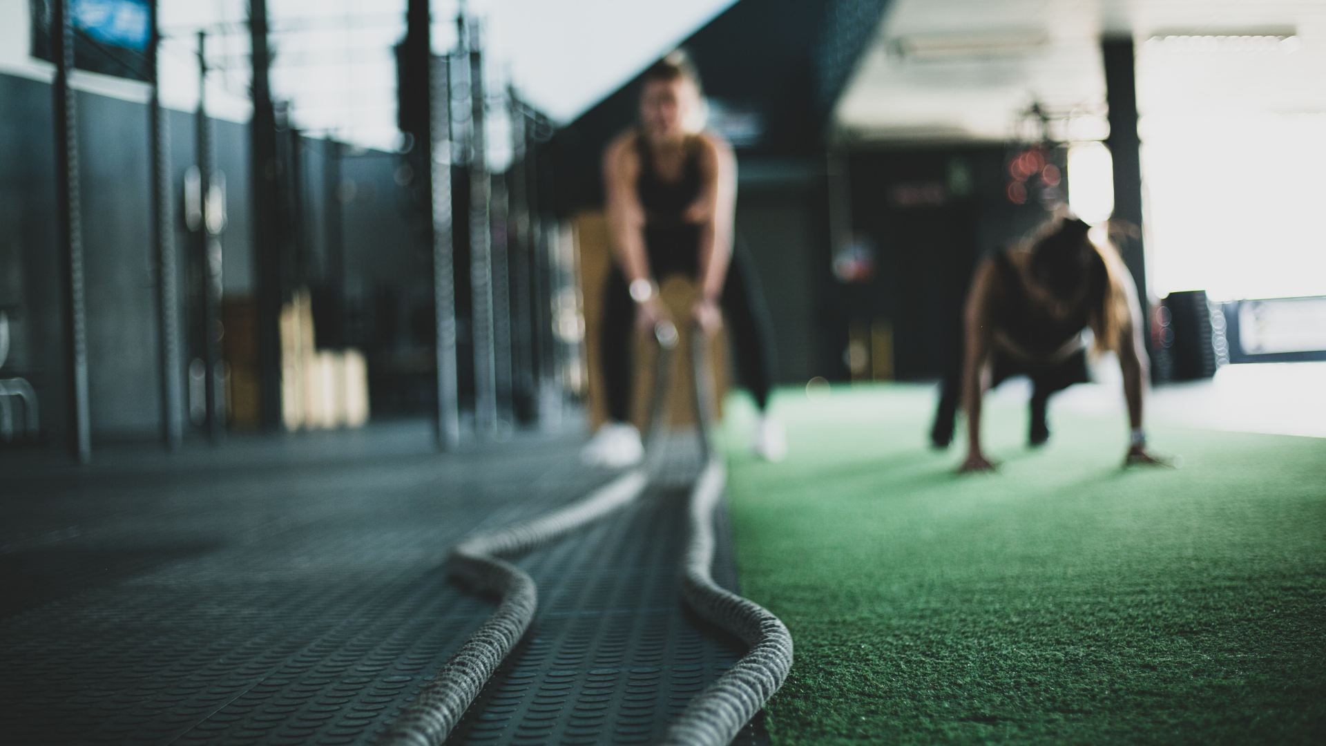 two people working out in gym
