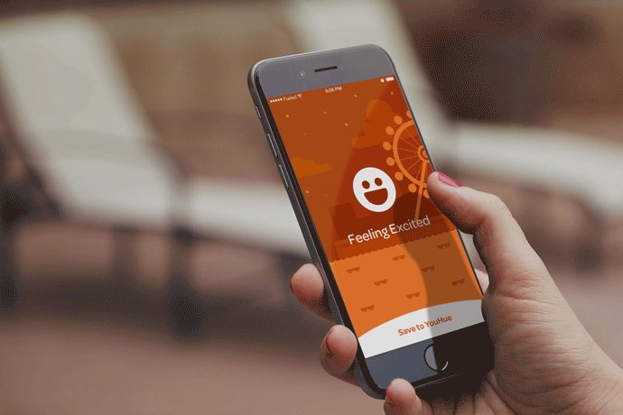 man holding phone showing fancy ux motion design